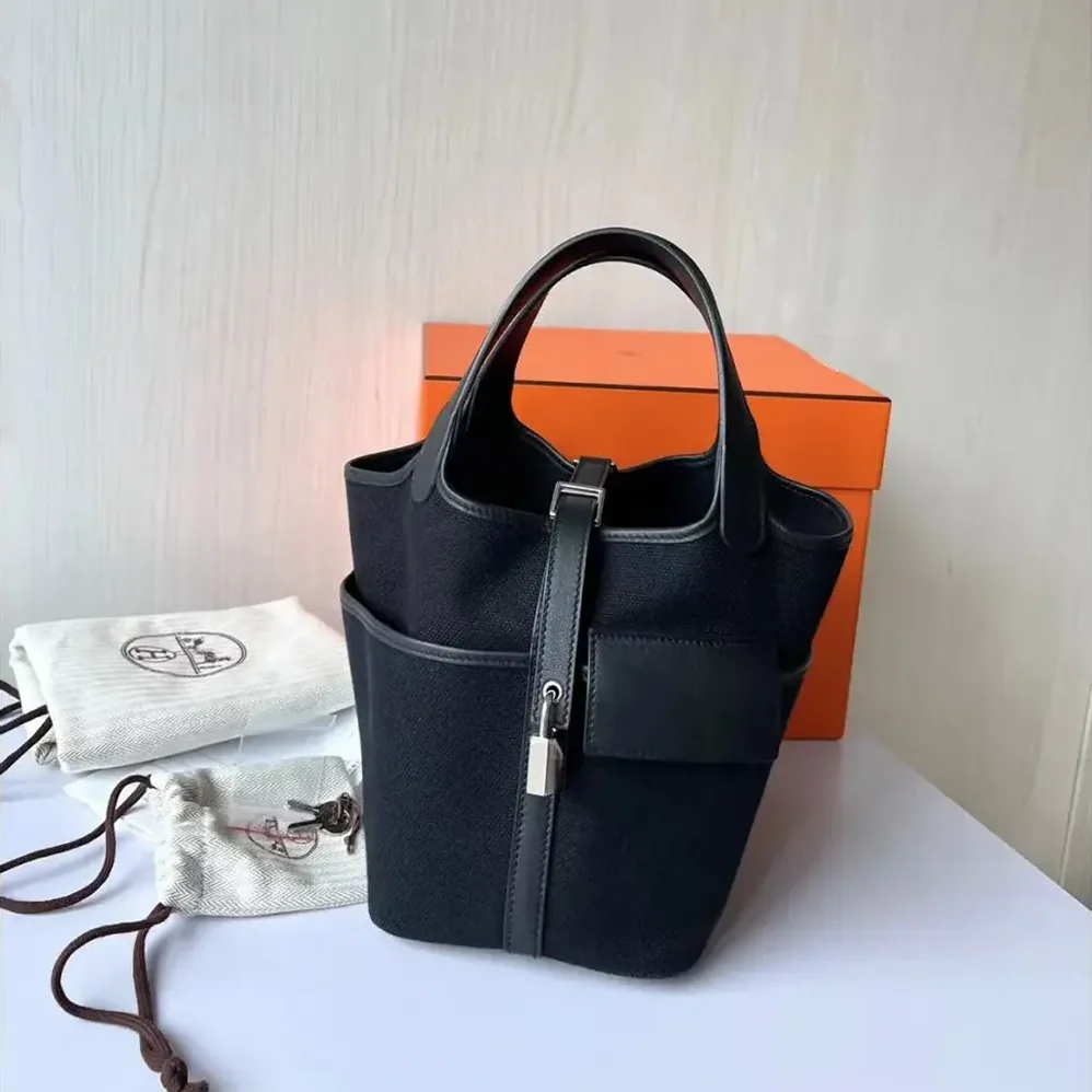 Hermes Picotin Lock 18 Pockets in Goeran Canvas Leather for Women in Black Hermes Picotin Lock 18 Pockets in Goeran Canvas Leather for Women in Black