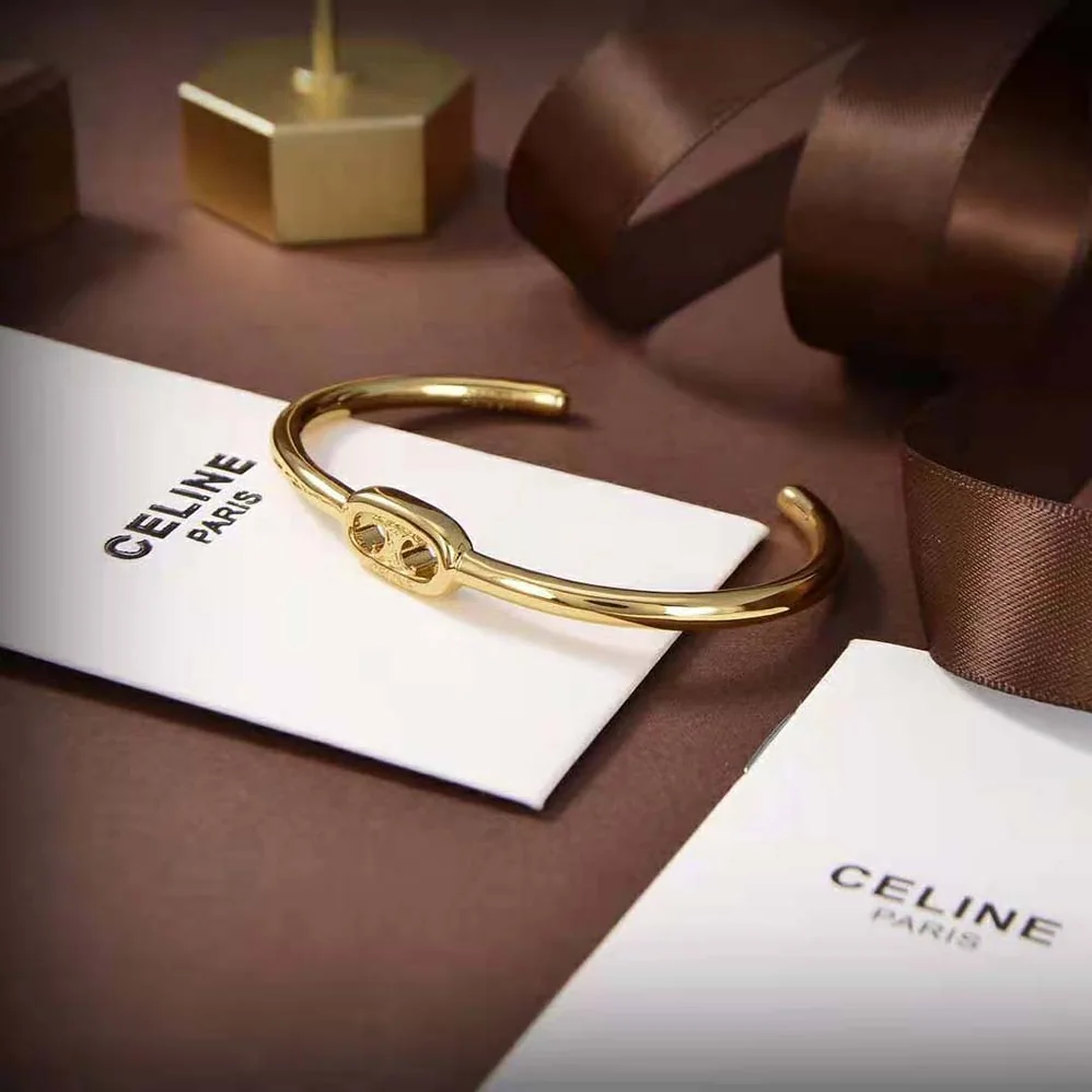 Celine Maillon Triomphe Thin Cuff in Brass with Gold Finish for Women