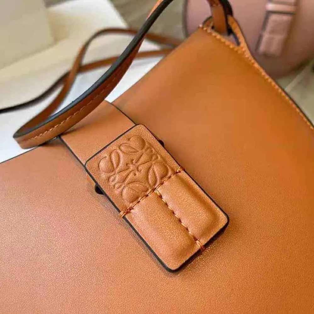 Loewe Moulded Bucket Bag in Calfskin for Women in Brown
