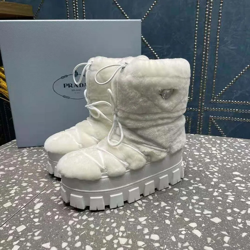 Prada Shearling Apres-ski Boots for Women in White