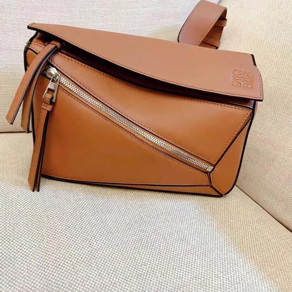 Loewe Small Puzzle Bumbag in Classic Calfskin for Unisex in Brown