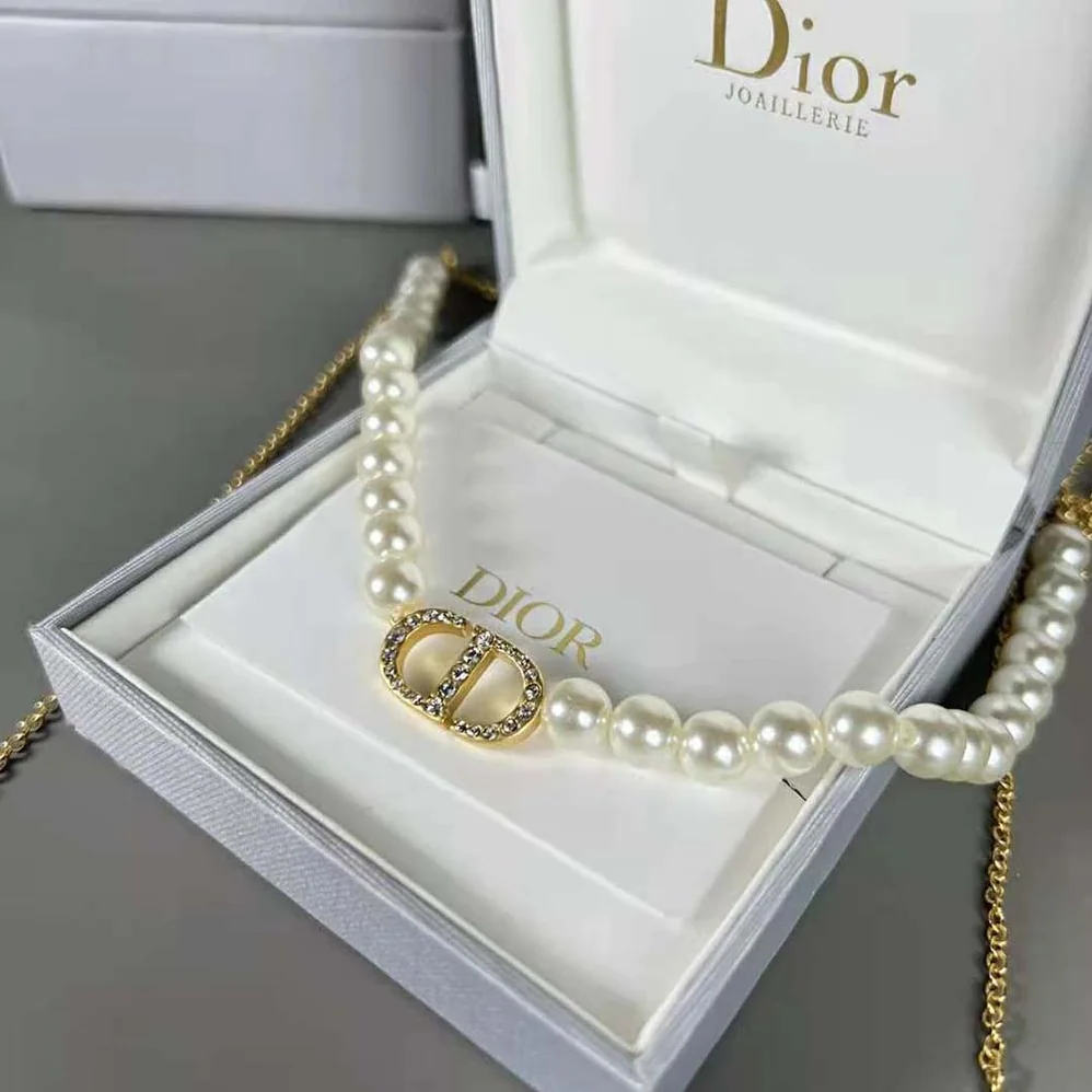 Dior Petit CD Necklace for Headphones Gold for Women in Finish Metal Dior Petit CD Necklace for Headphones Gold for Women in Finish Metal
