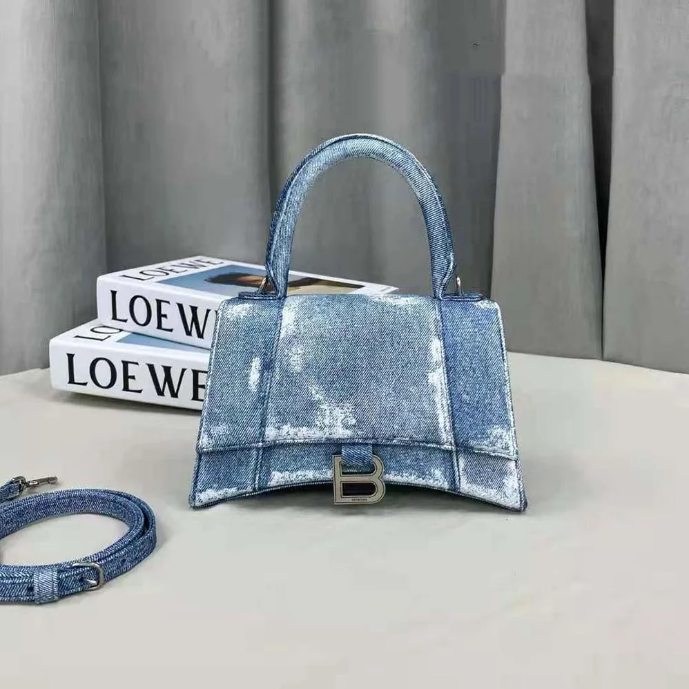 Balenciaga Hourglass Small Handbag Denim Printed in Indigo for Women in Blue Balenciaga Hourglass Small Handbag Denim Printed in Indigo for Women in Blue