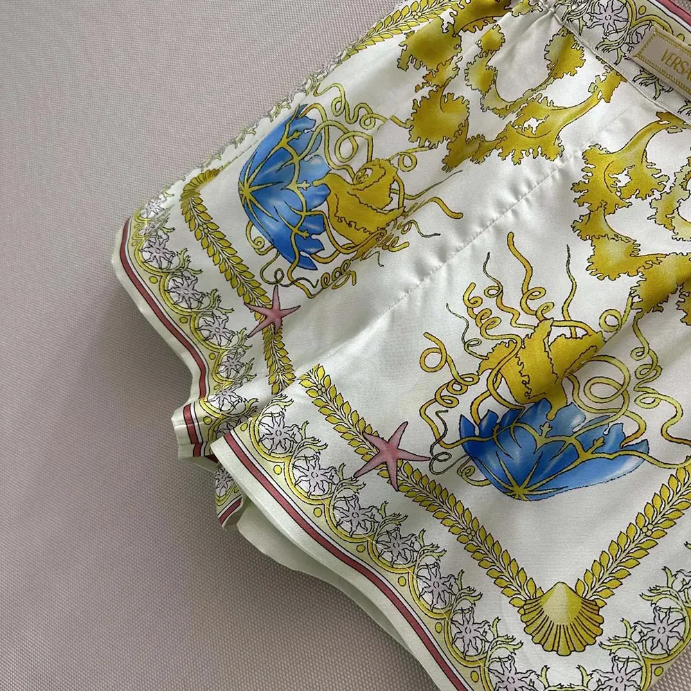 Versace Underwater Barocco Silk Shorts for Women in Yellow Versace Underwater Barocco Silk Shorts for Women in Yellow