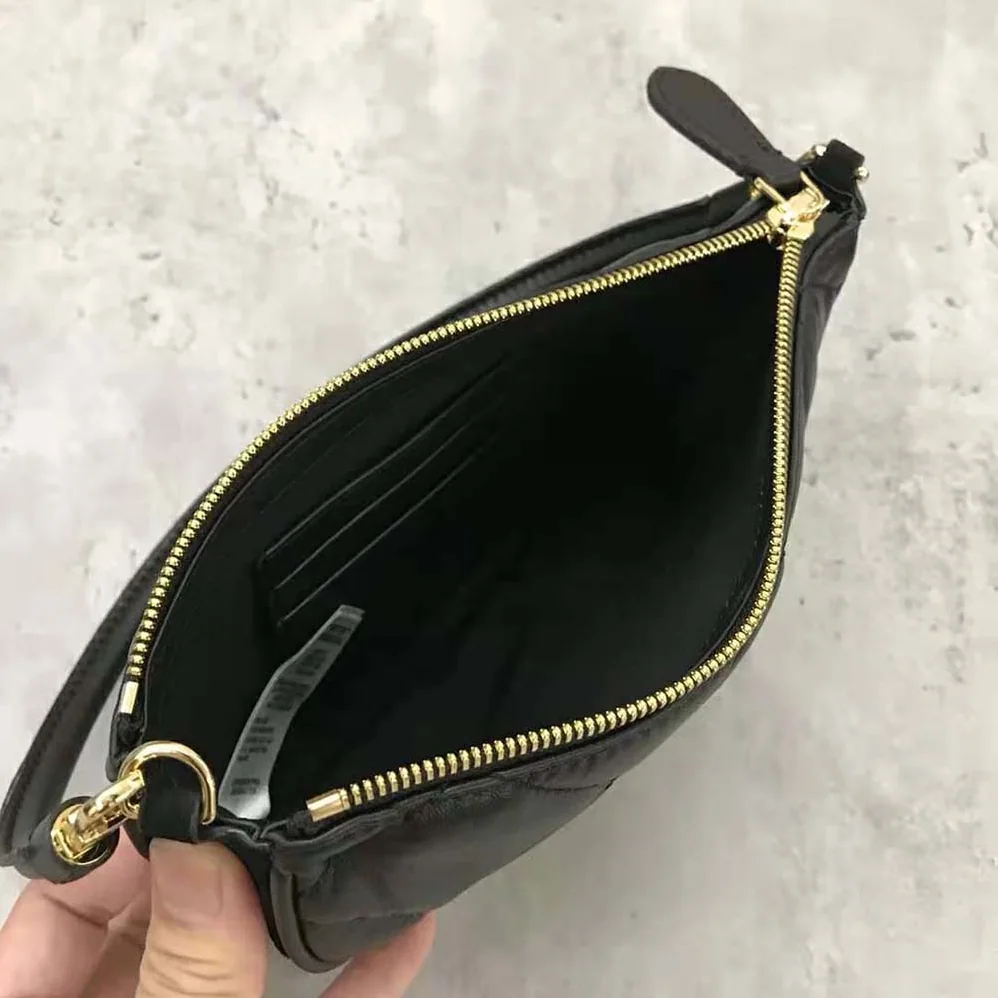 Burberry Quilted Lambskin Olympia Pouch for Women in Black Burberry Quilted Lambskin Olympia Pouch for Women in Black