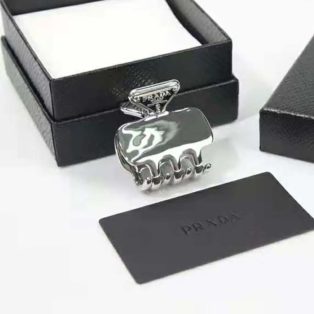 Prada Metal Hair Clip with Enameled for Women in Metal Triangle Logo Prada Metal Hair Clip with Enameled for Women in Metal Triangle Logo