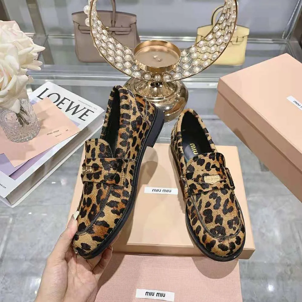 Miu Miu Leopard-print Calf Hair for Women in effect Loafers