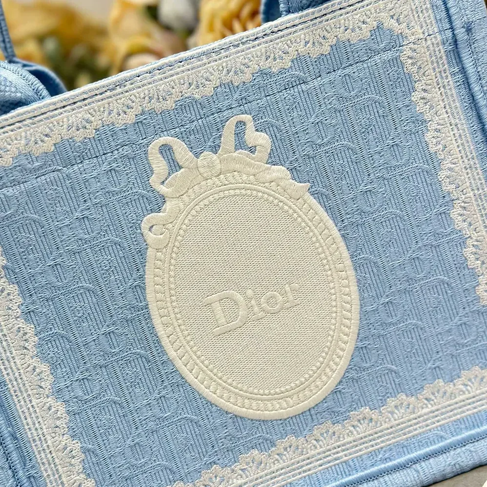 Dior Small Dior Book Tote with Strap Celestial Blue Dior Oblique Embroidery with White Lace and Dior Médaillon for Women Dior Small Dior Book Tote with Strap Celestial Blue Dior Oblique Embroidery with White Lace and Dior Médaillon for Women