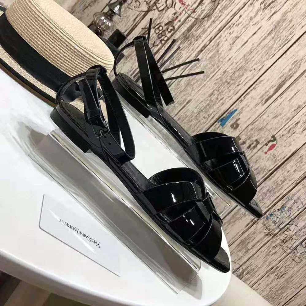 Saint Laurent YSL Tribute Flat Sandals in Patent Leather for Women Saint Laurent YSL Tribute Flat Sandals in Patent Leather for Women