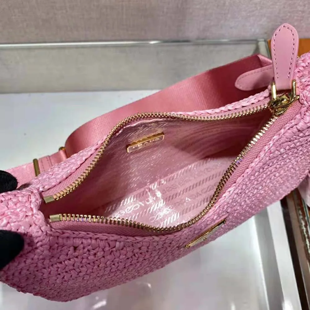 Prada Re-Edition 2005 Raffia Bag for Women in Pink Prada Re-Edition 2005 Raffia Bag for Women in Pink