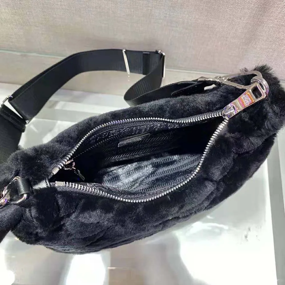 Prada A Patchwork-style Triangle Motif Characterizes Shearling Shoulder Bag for Women in Black Prada A Patchwork-style Triangle Motif Characterizes Shearling Shoulder Bag for Women in Black