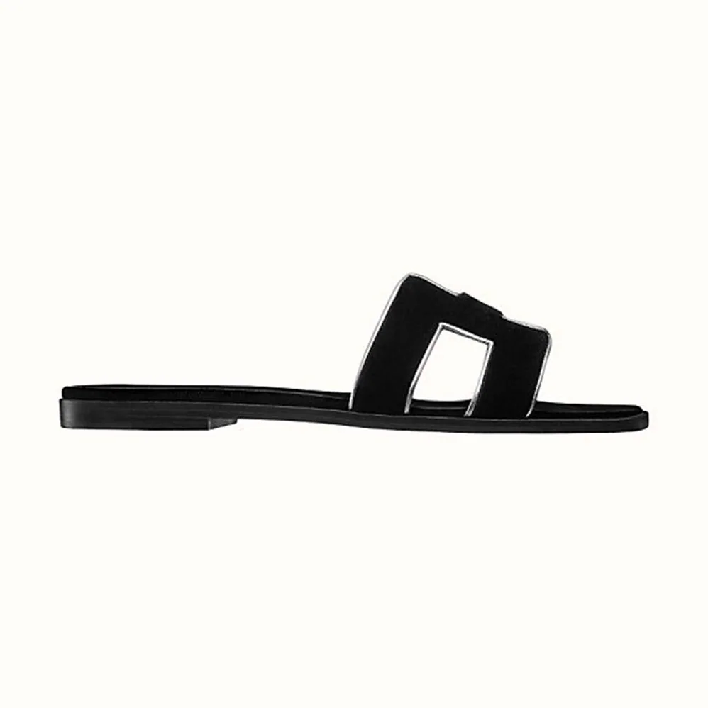Hermes Oran Sandal in Velvet and Nappa Leather with Metallic Finish and Iconic “H” Cut-Out for Women in Black Hermes Oran Sandal in Velvet and Nappa Leather with Metallic Finish and Iconic “H” Cut-Out for Women in Black