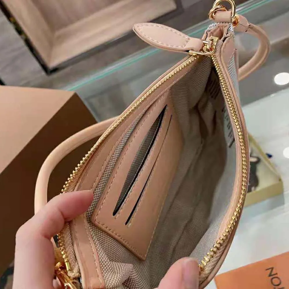 Burberry Embossed Logo Canvas and Leather Olympia Pouch for Women