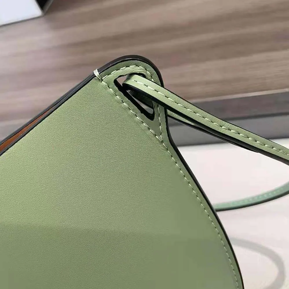 Loewe Moulded Bucket Bag in Calfskin for Women in Lime Loewe Moulded Bucket Bag in Calfskin for Women in Lime