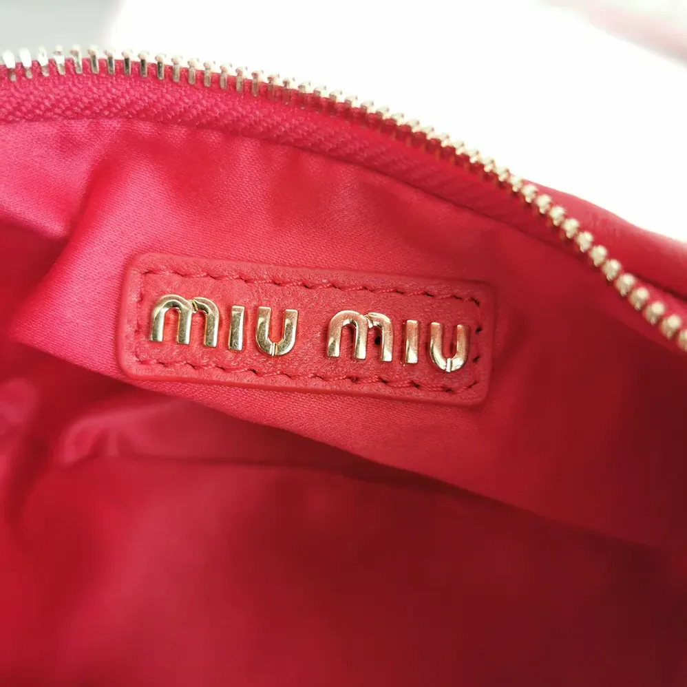 Miu Miu Wander Matelassé Nappa Leather Hobo Mini-Bag for Women in Red Miu Miu Wander Matelassé Nappa Leather Hobo Mini-Bag for Women in Red