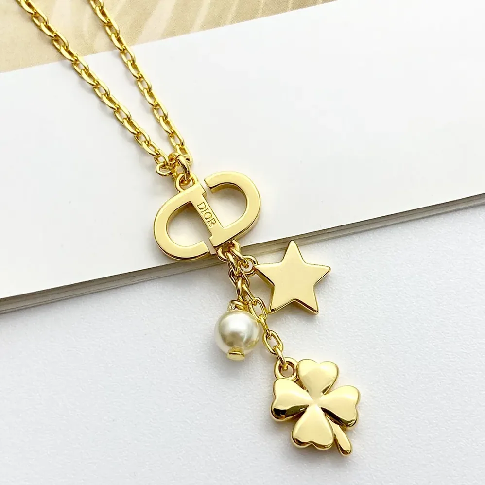 Dior Petit CD Lucky Charms Necklace Gold-Finish Metal with a White Resin Pearl and Silver for Women in Tone Crystals Dior Petit CD Lucky Charms Necklace Gold-Finish Metal with a White Resin Pearl and Silver for Women in Tone Crystals