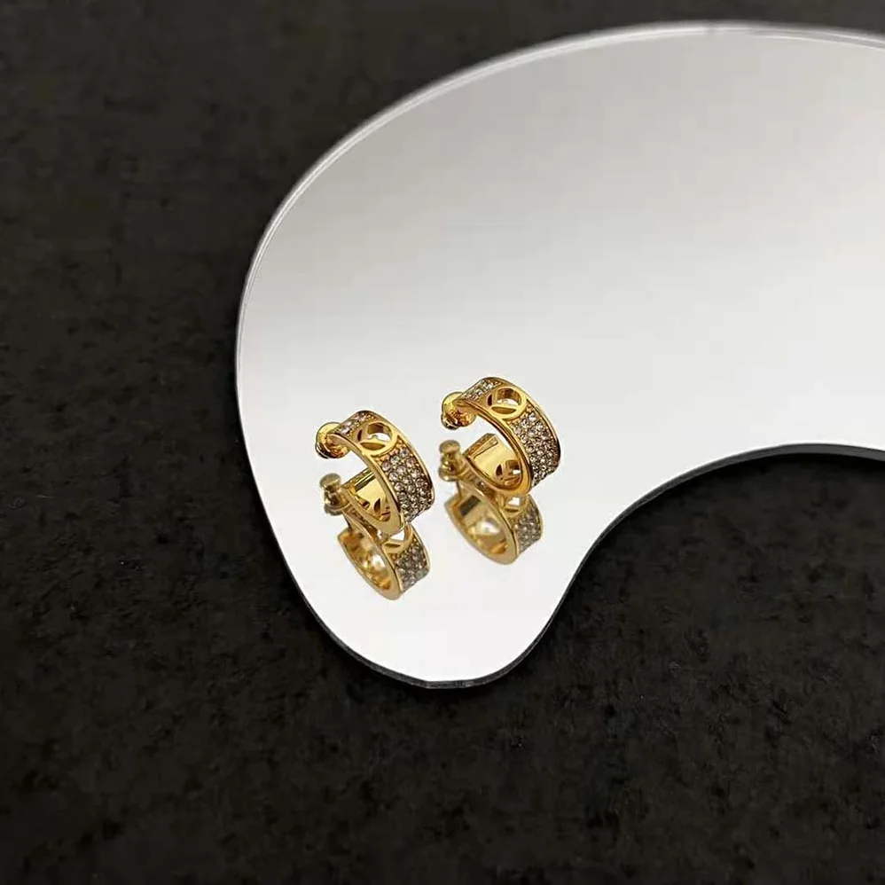 Fendi Small Hoop Earrings with F is Fendi Motif Gold for Women in coloured Fendi Small Hoop Earrings with F is Fendi Motif Gold for Women in coloured