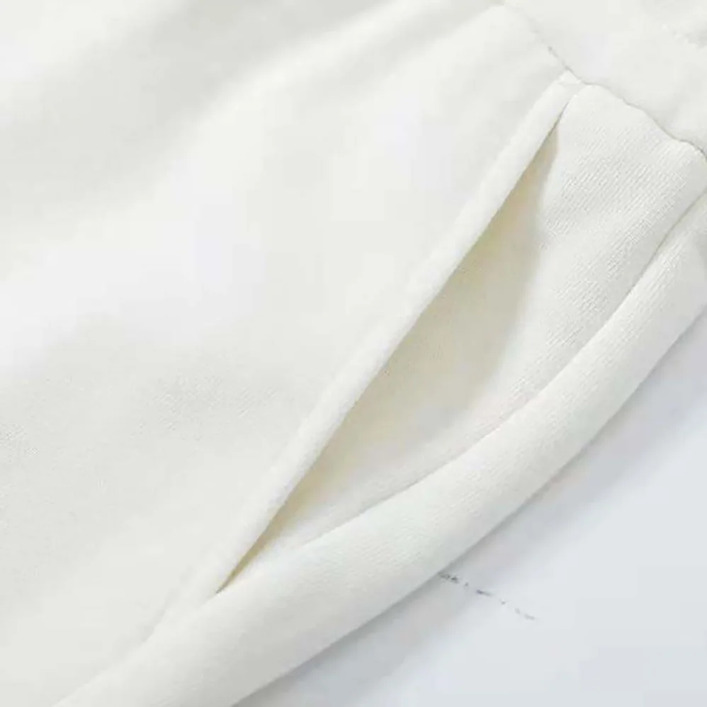 Givenchy Archetype Bermuda Shorts in Fleece for Men in White Givenchy Archetype Bermuda Shorts in Fleece for Men in White