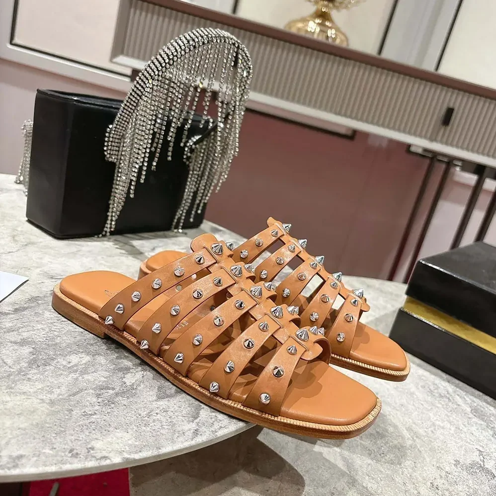 Christian Louboutin Charja Mules Waxed Calf Leather for Women in Brown Christian Louboutin Charja Mules Waxed Calf Leather for Women in Brown