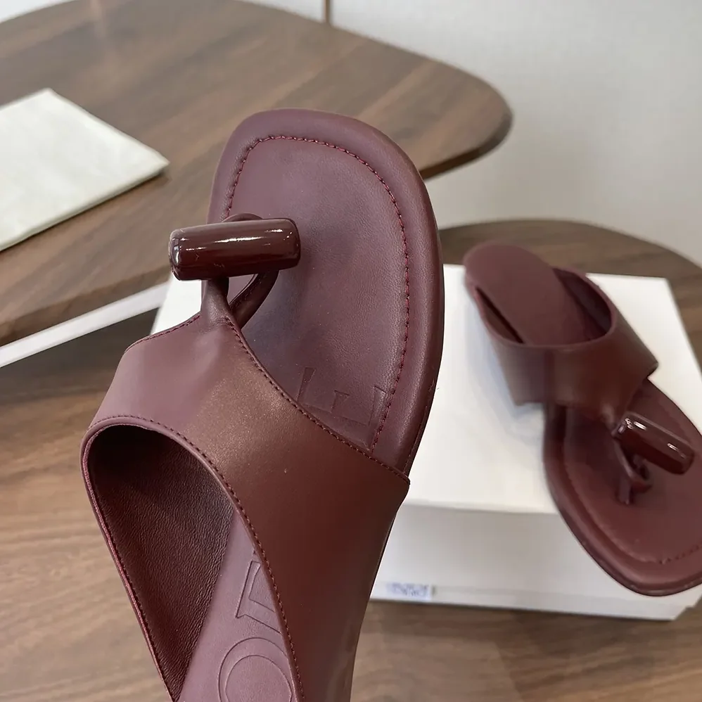 Loewe Toggle Flat Sandal in Shiny Smoot Calfskin for Women in Burnt Red Loewe Toggle Flat Sandal in Shiny Smoot Calfskin for Women in Burnt Red