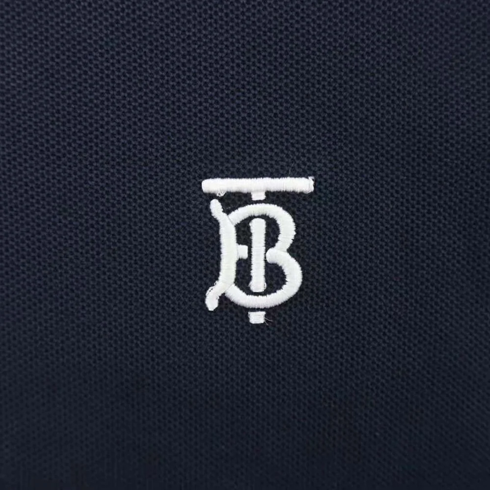 Burberry Icon Stripe Placket Cotton Piqué Polo Shirt for Men in Navy Burberry Icon Stripe Placket Cotton Piqué Polo Shirt for Men in Navy