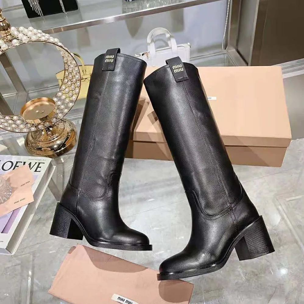 Miu Miu Leather Booties with Screen-printed Logo for Women in Black