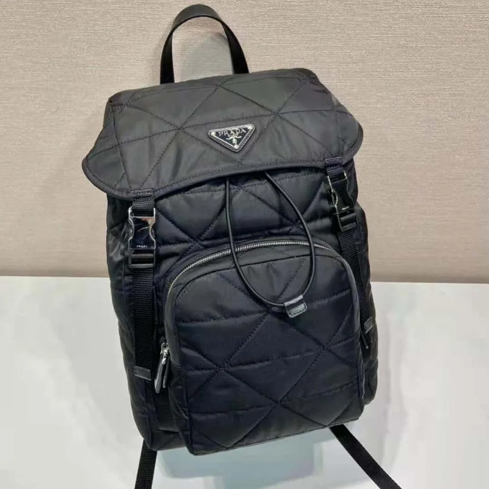 Prada Re-Nylon Backpack with Topstitching for Men in Black Prada Re-Nylon Backpack with Topstitching for Men in Black