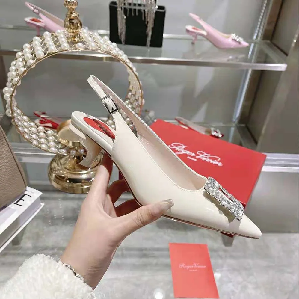 Roger Vivier Virgule Strass Buckle Slingback Pumps in Patent Leather for Women in White Roger Vivier Virgule Strass Buckle Slingback Pumps in Patent Leather for Women in White