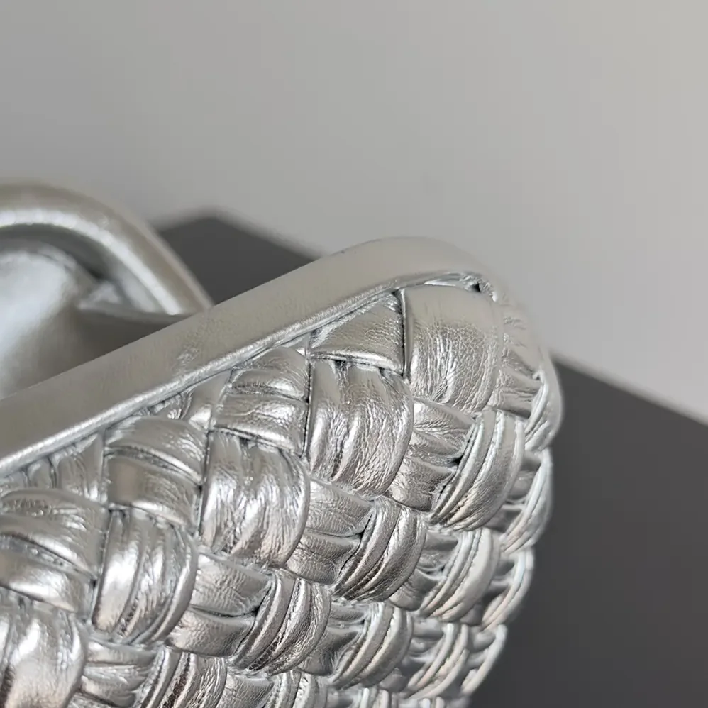 Bottega Veneta Knot Pressed Intreccio Laminated Leather Minaudiere for Women in Silver Bottega Veneta Knot Pressed Intreccio Laminated Leather Minaudiere for Women in Silver
