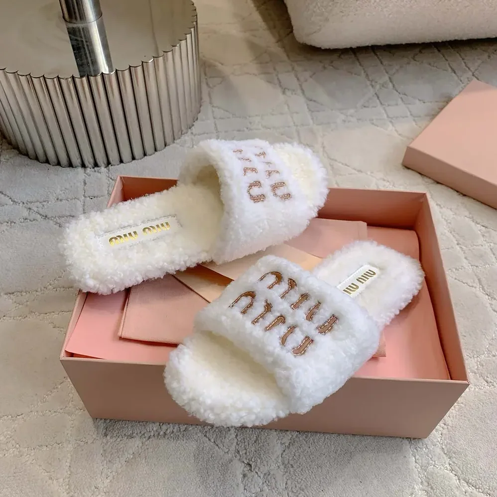 Miu Miu Shearling Slides with Leather Logo for Women