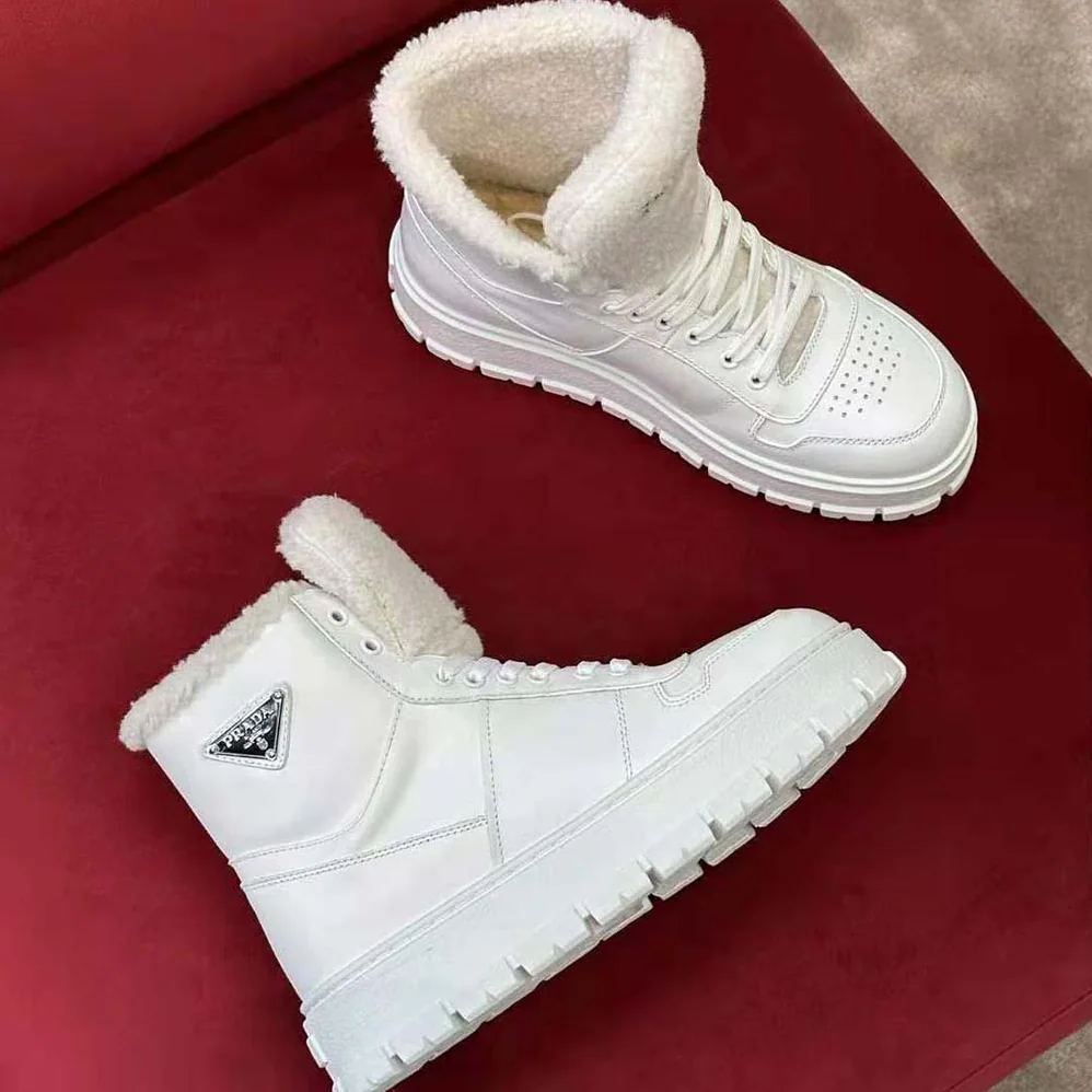 Prada Leather and Shearling High-Top Sneakers for Women in White Prada Leather and Shearling High-Top Sneakers for Women in White