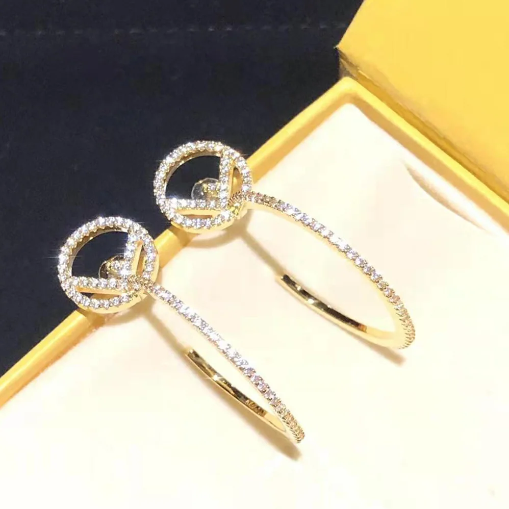 Fendi F is Fendi Earring Gold for Women in color Fendi F is Fendi Earring Gold for Women in color