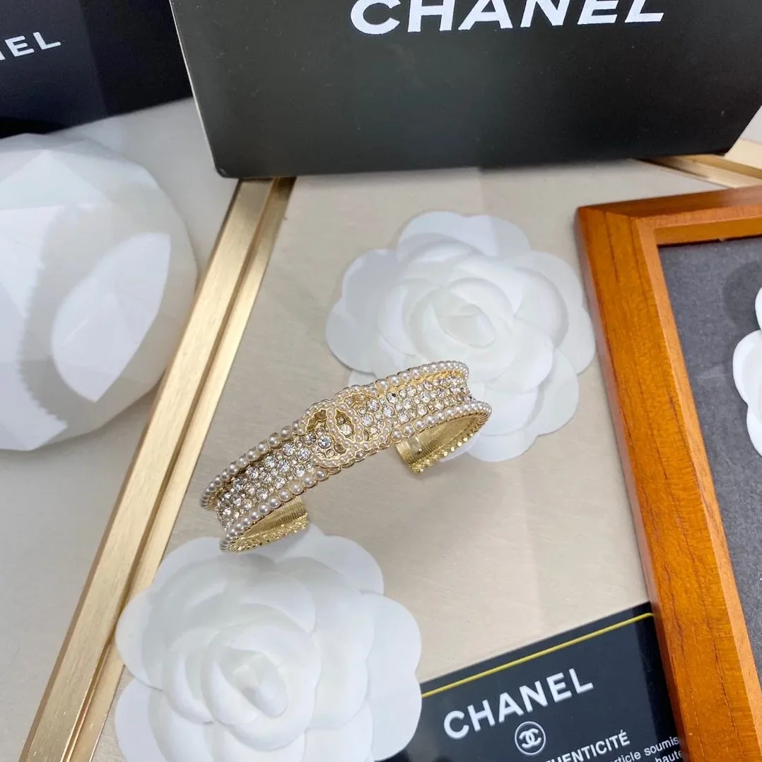Chanel Pearl And Crystal Interlocking CC Cuff Bracelet Gold Hardware Chanel Pearl And Crystal Interlocking CC Cuff Bracelet Gold Hardware