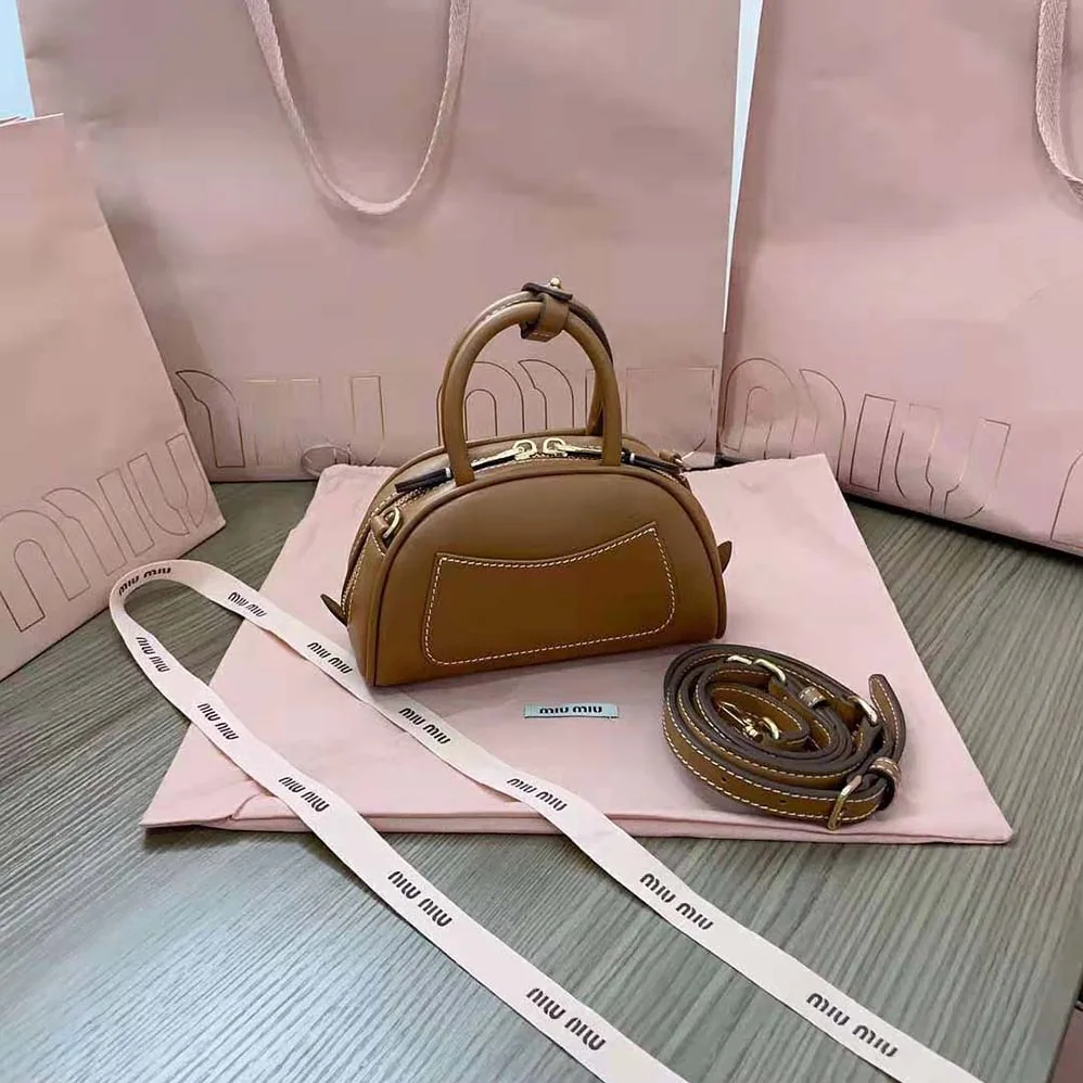 Miu Miu Mini Leather Top-handle Bag for Women in Brown