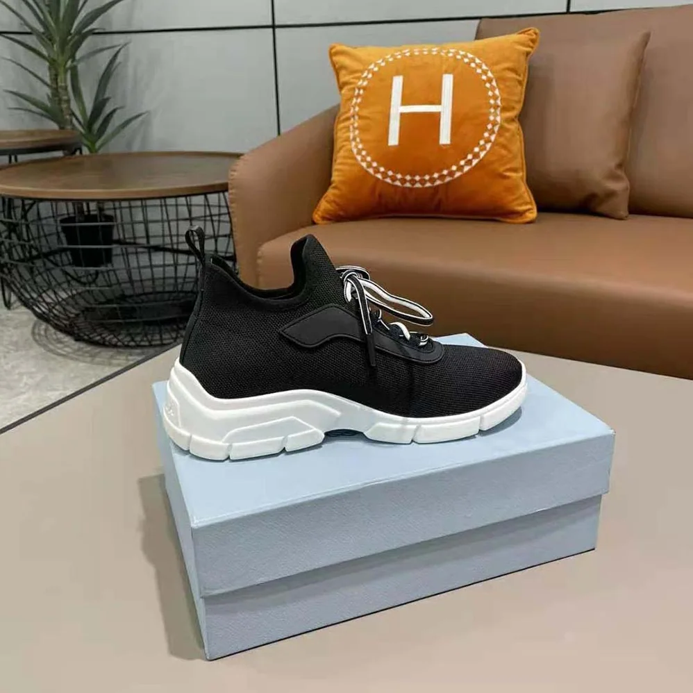 Prada The Triangle Logo Decorates These Knit Fabric Sneakers for Women in Black