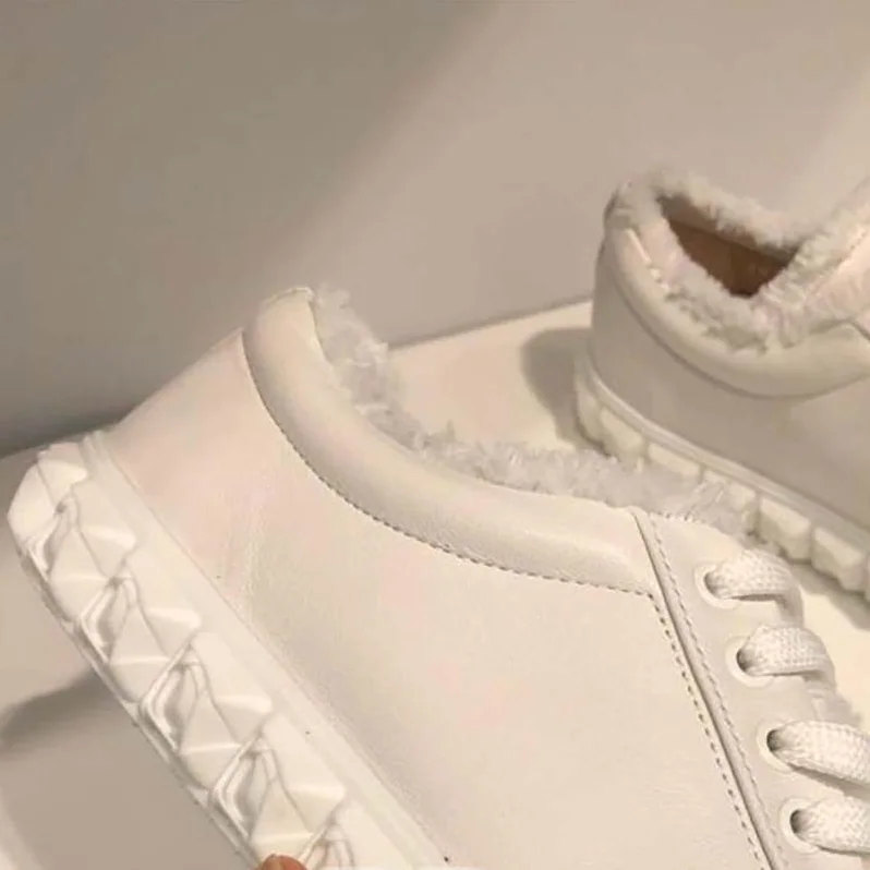 Stuart Weitzman The Fringiecoverstory Sneaker 25mm Heel Height for Women in White Stuart Weitzman The Fringiecoverstory Sneaker 25mm Heel Height for Women in White