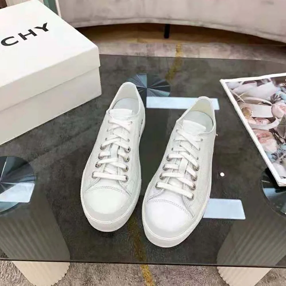 Givenchy Sneakers City in Canvas and Leather for Women in White Givenchy Sneakers City in Canvas and Leather for Women in White