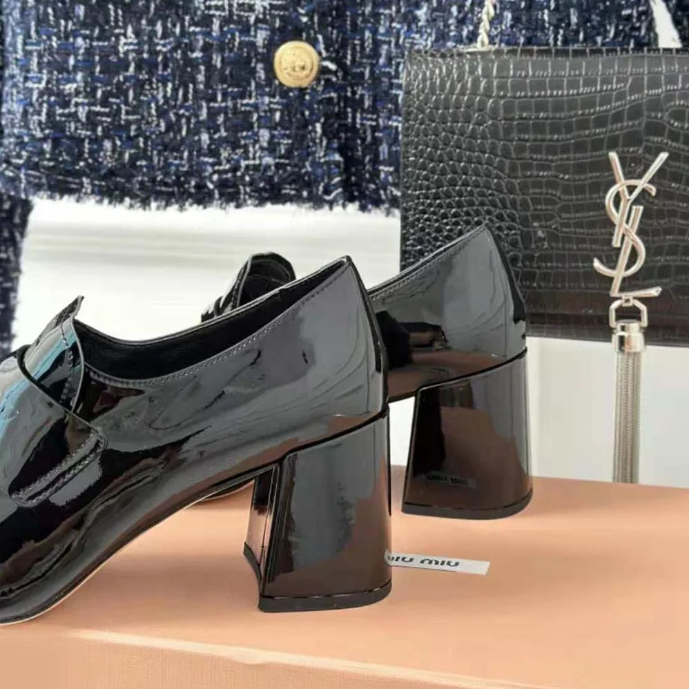 Miu Miu Patent Leather Loafers with Embossed Logo on the Tongue for Women in Black Miu Miu Patent Leather Loafers with Embossed Logo on the Tongue for Women in Black