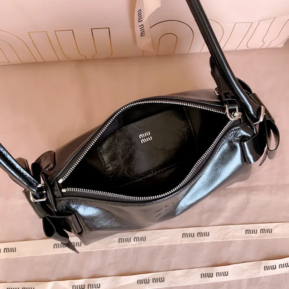 Miu Miu Shiny Leather Pouch for Women in Black Miu Miu Shiny Leather Pouch for Women in Black