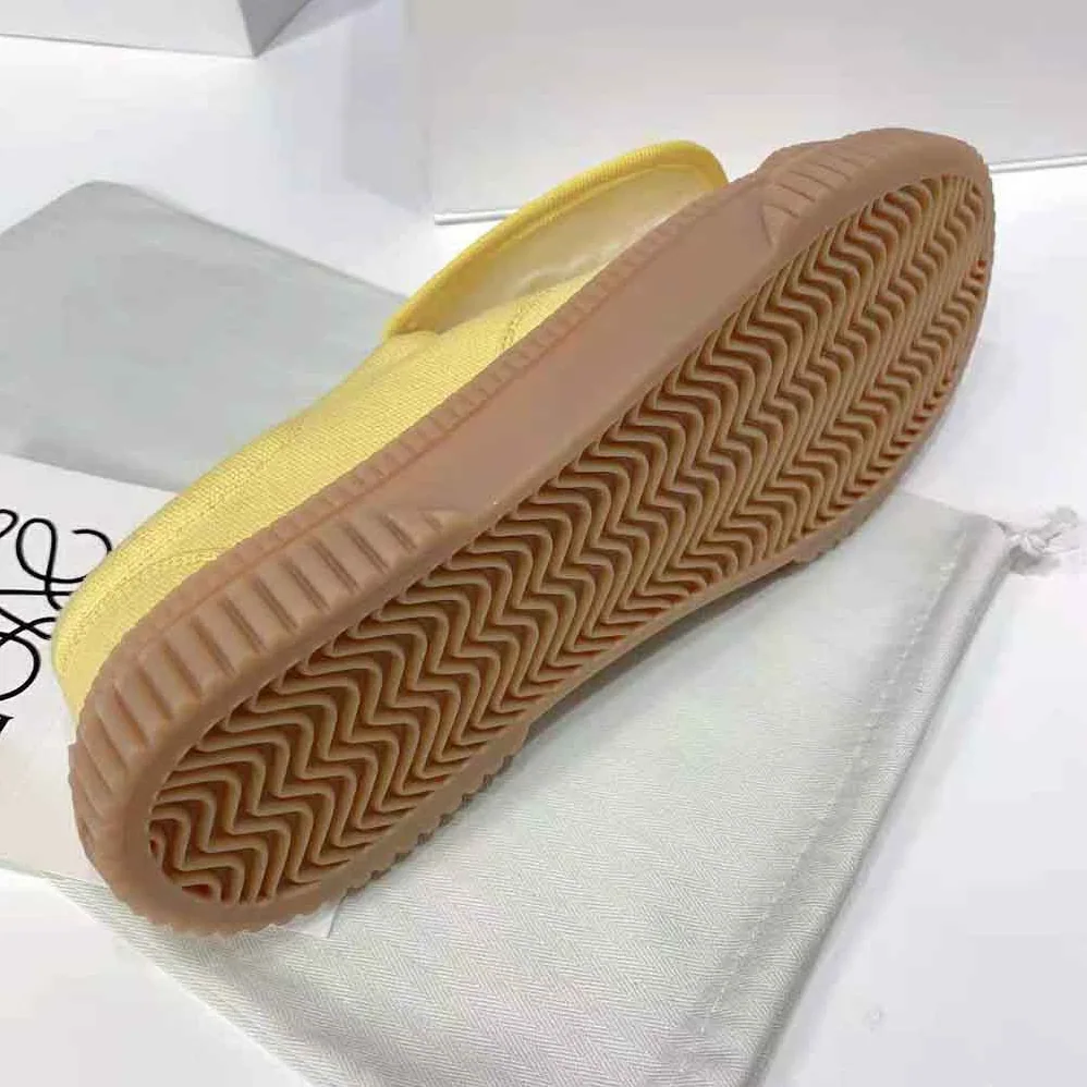 Loewe Anagram Flap Sneaker in Canvas for Women in Yellow Loewe Anagram Flap Sneaker in Canvas for Women in Yellow