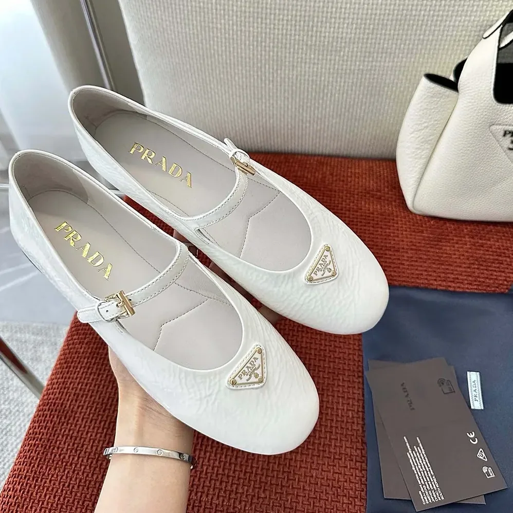 Prada Naplak Patent Leather Ballerinas for Women in White Prada Naplak Patent Leather Ballerinas for Women in White