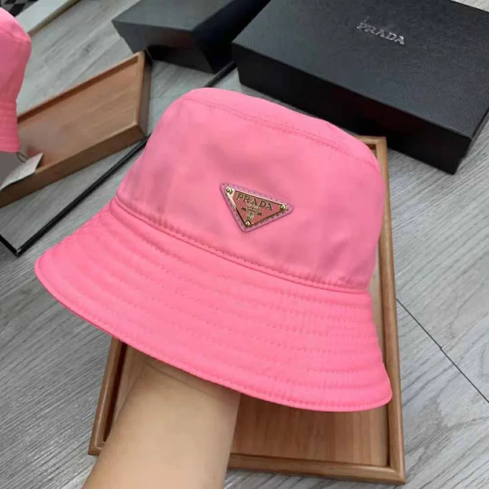 Prada Nylon Bucket Hat Decorated with the Triangle Logo for Women in Pink Prada Nylon Bucket Hat Decorated with the Triangle Logo for Women in Pink