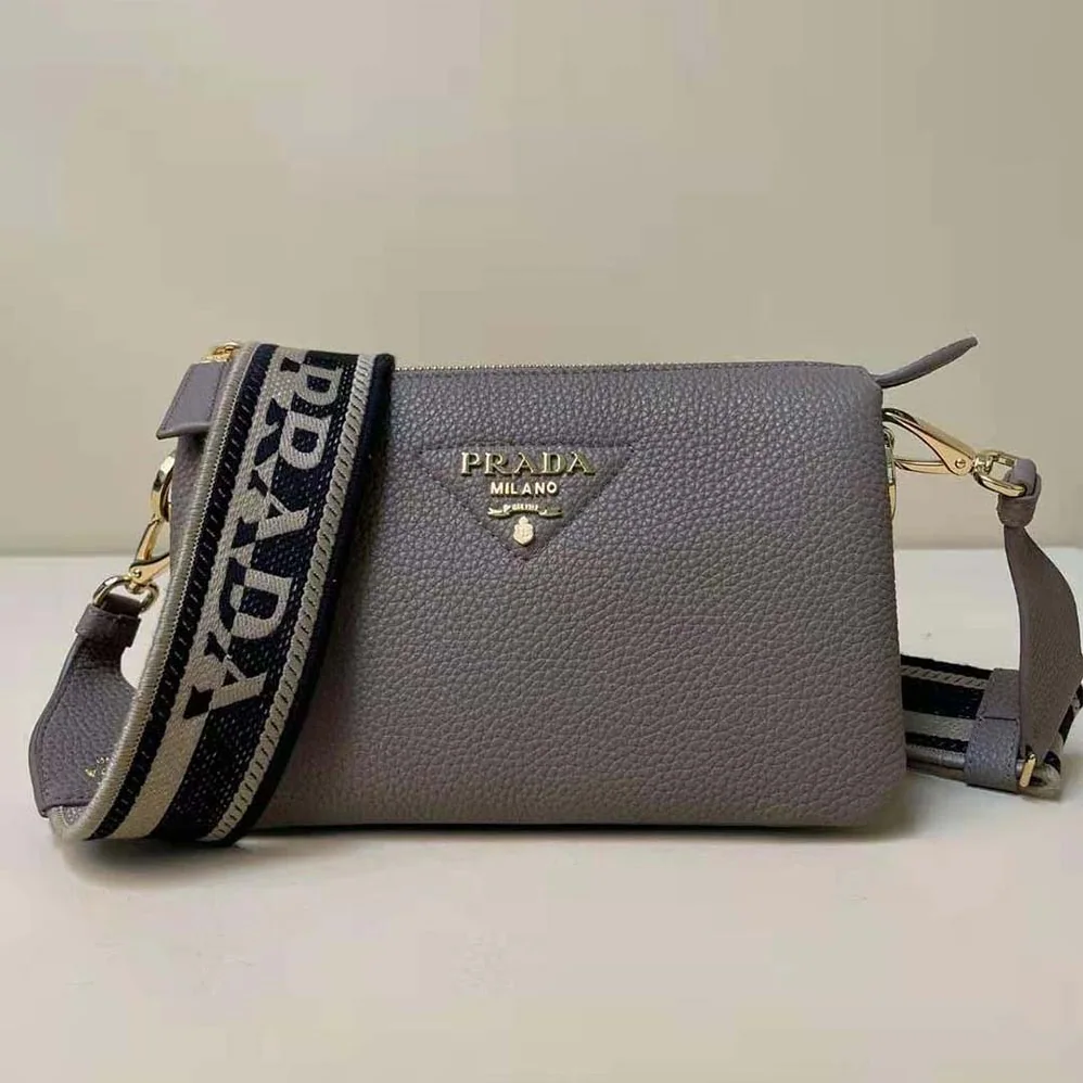Prada Leather Shoulder Bag with Metal Lettering Logo for Women in Gray Prada Leather Shoulder Bag with Metal Lettering Logo for Women in Gray