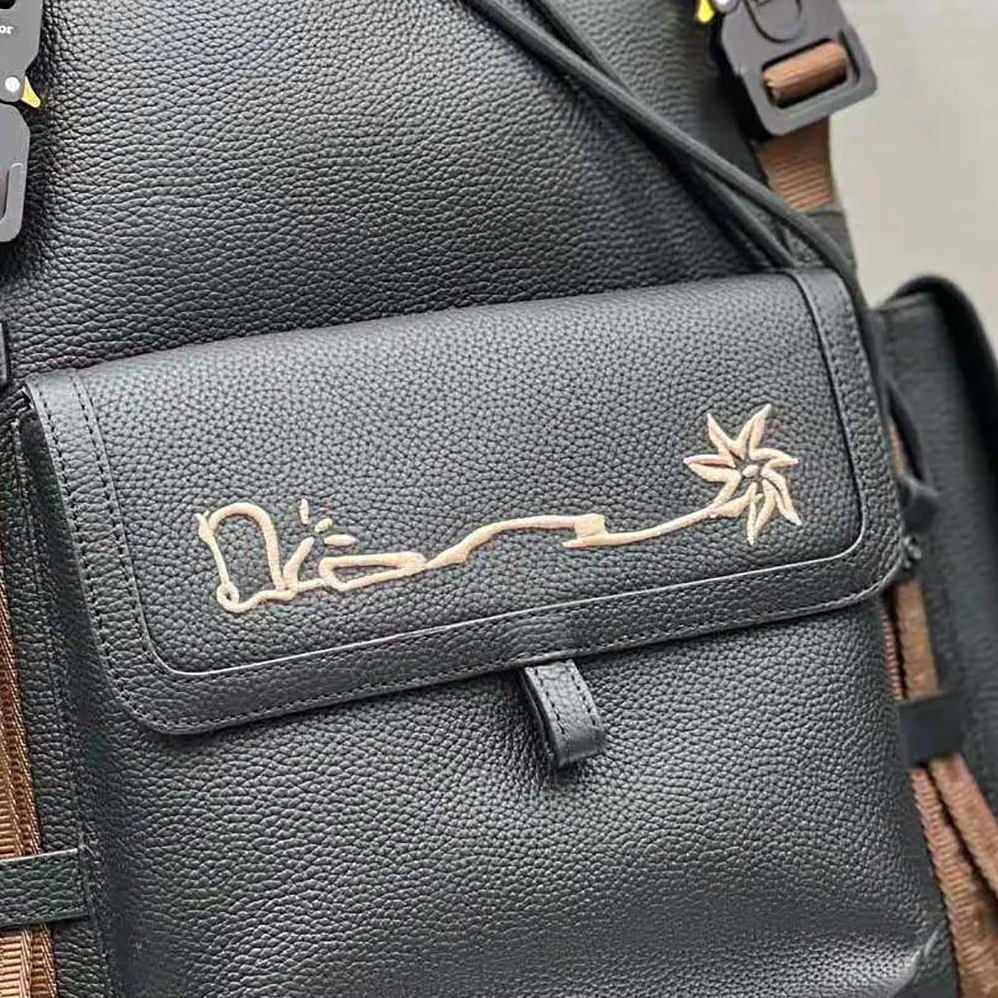 Dior Hit the Road Cactus Jack Dior Backpack Black Grained Calfskin with Embroidered Signature for Men Dior Hit the Road Cactus Jack Dior Backpack Black Grained Calfskin with Embroidered Signature for Men