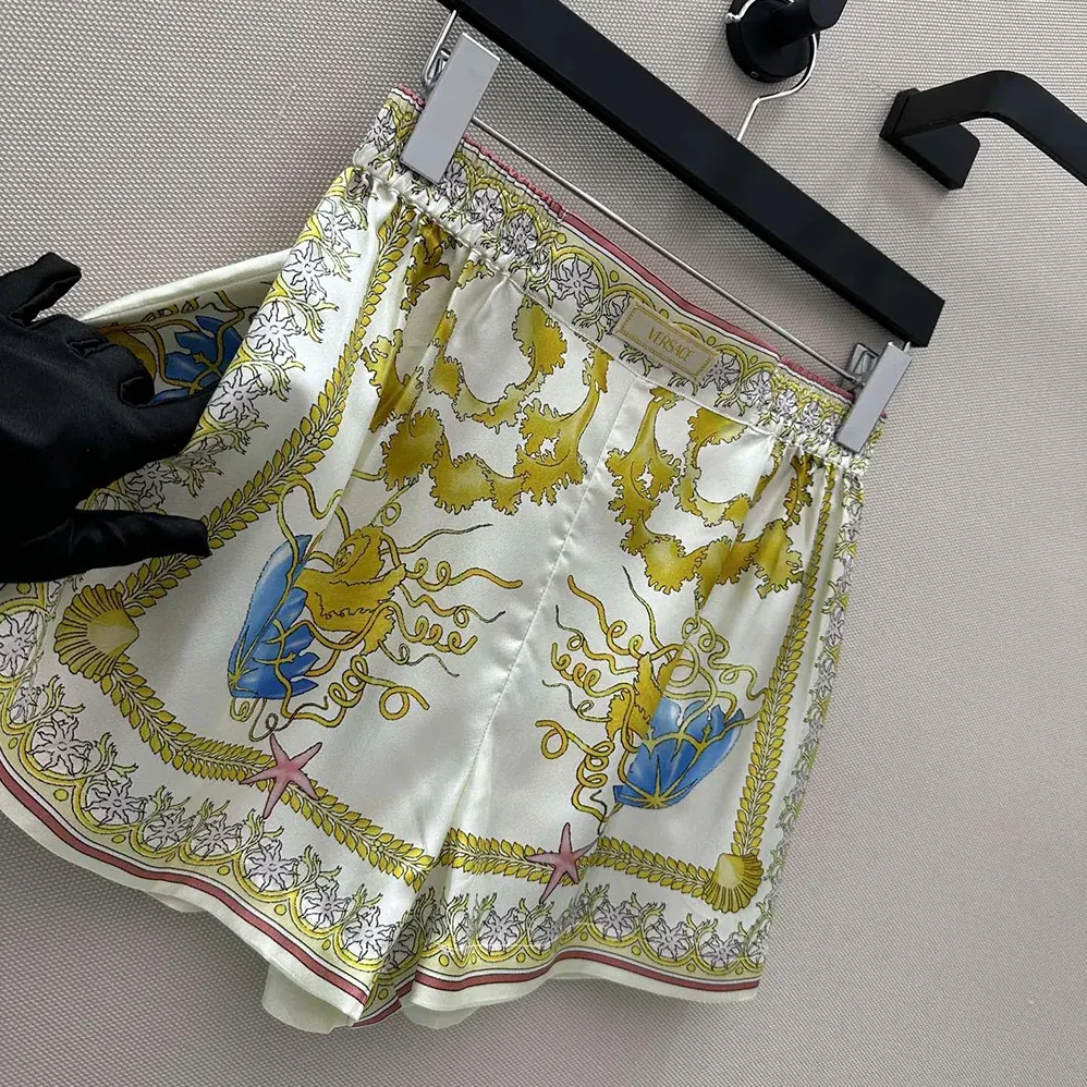 Versace Underwater Barocco Silk Shorts for Women in Yellow Versace Underwater Barocco Silk Shorts for Women in Yellow