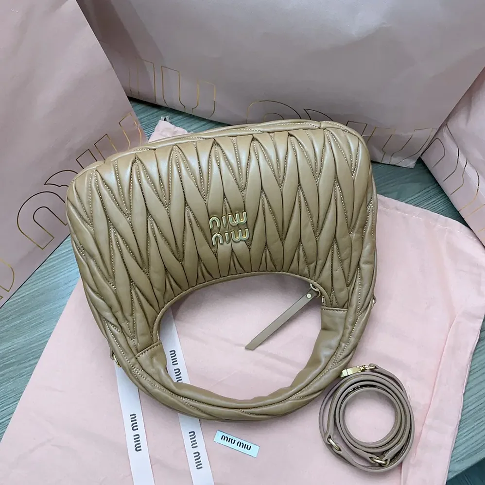 Miu Miu Wander Matelassé Nappa Leather Hobo Bag for Women in Caramel Miu Miu Wander Matelassé Nappa Leather Hobo Bag for Women in Caramel