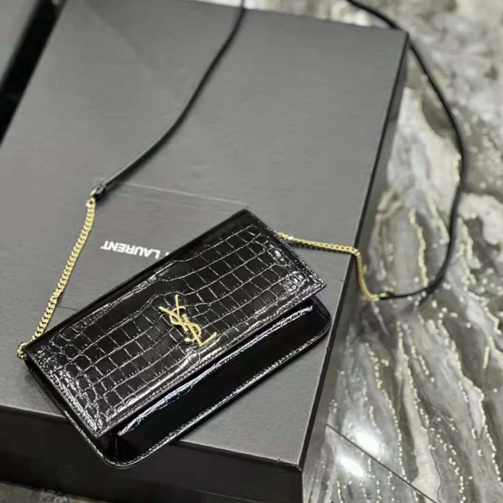 Saint Laurent YSL Cassandre Phone Holder with Strap in Shiny Crocodile-Embossed Leather for Women in Black Saint Laurent YSL Cassandre Phone Holder with Strap in Shiny Crocodile-Embossed Leather for Women in Black