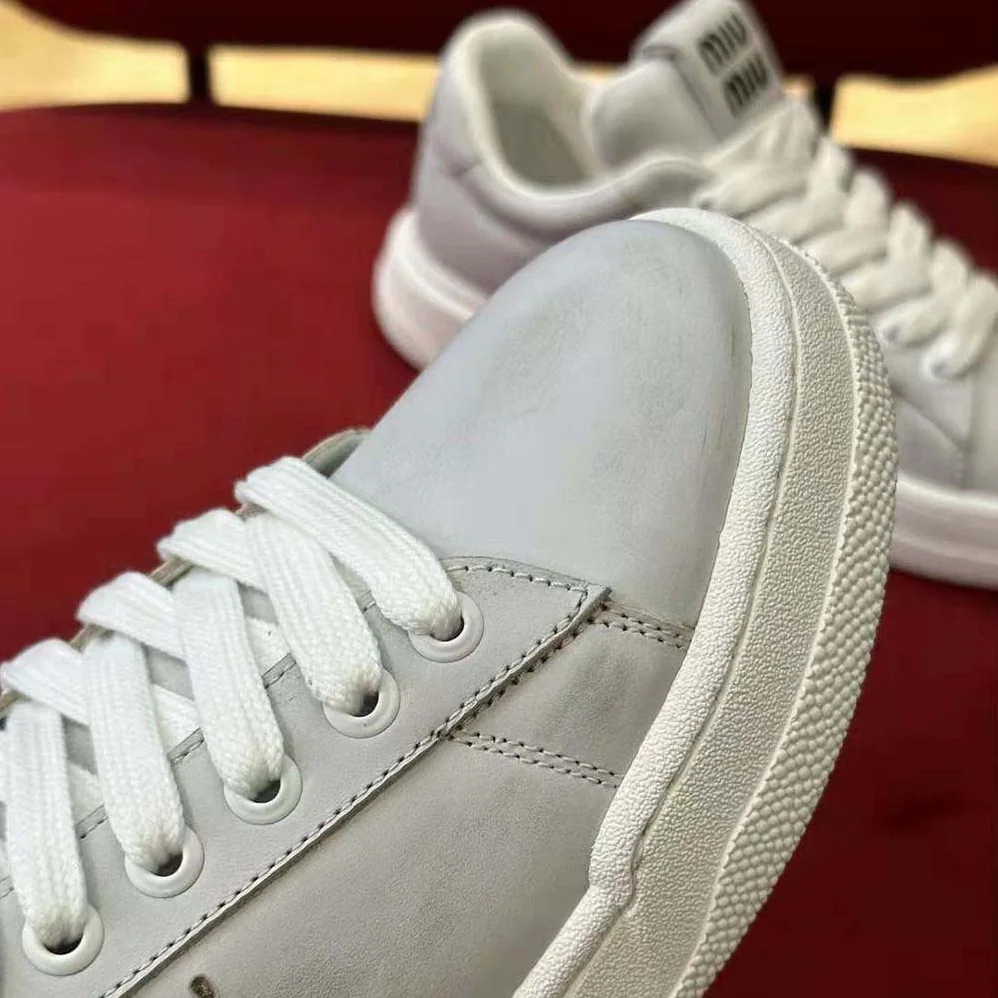 Miu Miu Bleached Leather Sneakers for Women in White