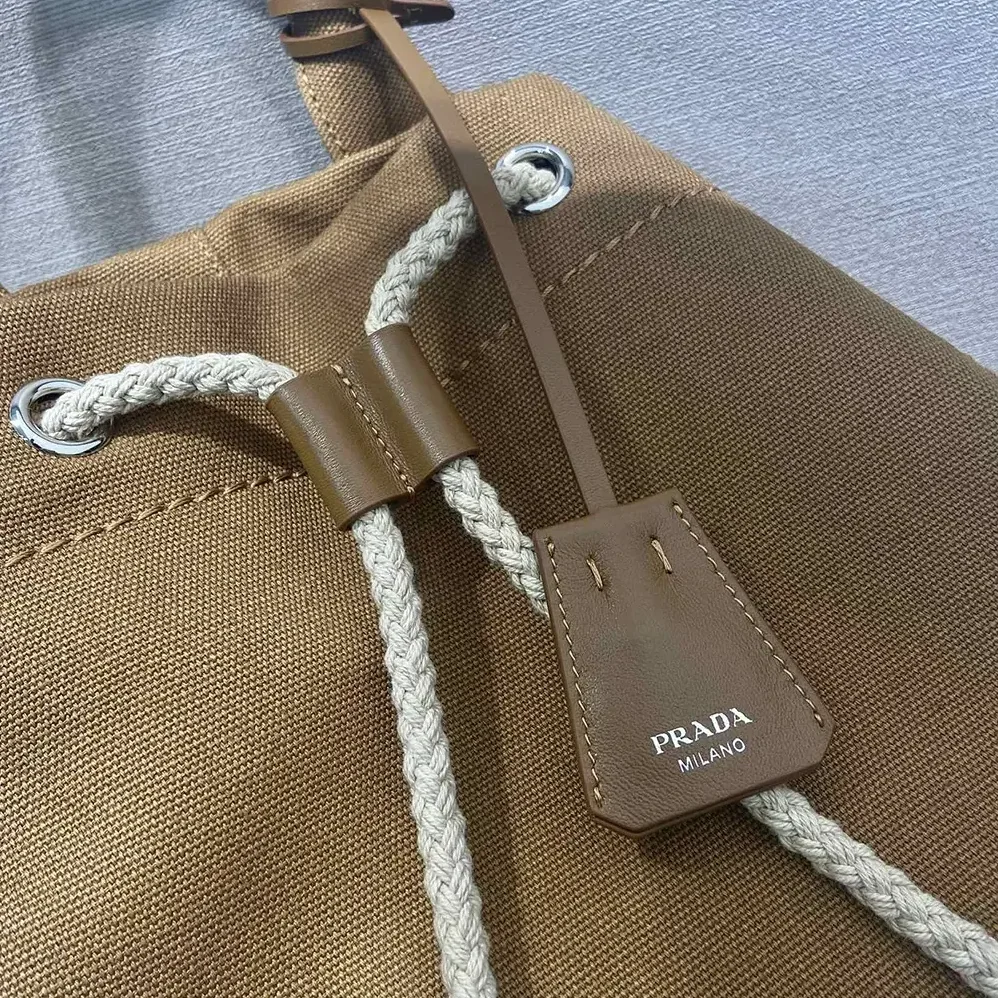 Prada Canvas Drawstring Duffle Bag for Unisex in Brown
