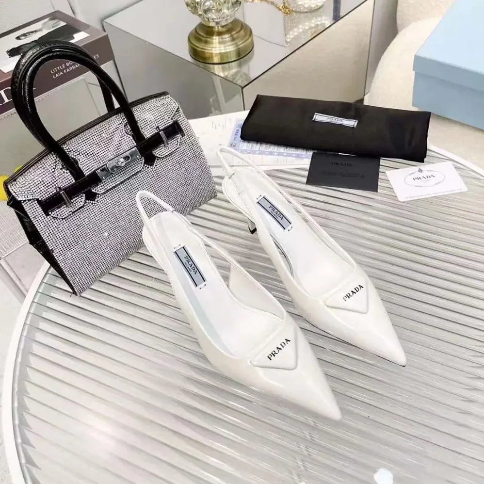 Prada Saffiano Patent Leather Slingback Pumps for Women in White Prada Saffiano Patent Leather Slingback Pumps for Women in White